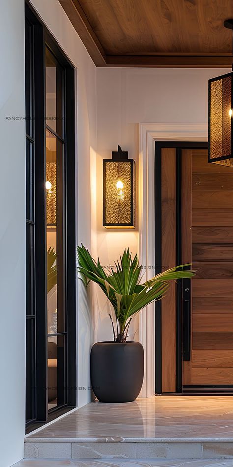 The stylish entrance door features contemporary front doors that add a modern touch. Doors, Front Doors, Entrance, Beautiful Entrance, Contemporary Front Doors, Entrance Door, Front Door, Sleek, Wall