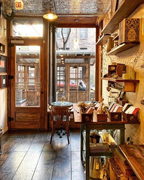 Susan Kaufman on Instagram: "I’m not really a tea drinker (more of a coffee lover), but @paquita is such a charming West Village tea shop, it could make me a convert. (242 W. 10th St.) Stepping inside is like being enveloped in a warm hug, especially on a cold winter day. Are you team tea or team coffee? Happy Friday, stay well and stay safe. #teashop #westvillage #mysecretnyc #walkwithmenewyork" Teashop Ideas Interior Design, Tea And Book Shop, Cozy Tea Shop, Cute Tea Shop, Small Tea Room, Tea Room Aesthetic, Tea Shop Aesthetic, Vintage Tea Shop, Tea Room Interior