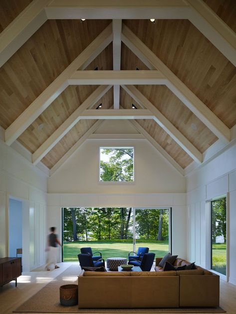 Booth Hansen along with Scott Christopher Homes designed this beach style retreat located in New Buffalo, Michigan. #livingroom Vaulted Ceiling Beams, Vaulted Ceiling Ideas, Painted Beams, Vaulted Ceiling Living Room, Popular Living Room, Tongue And Groove Ceiling, White Beams, Light Hardwood, Light Hardwood Floors