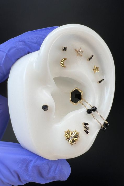 The perfect curation DOES exist! Solid 14k gold designs in black spinel, CZs, and black diamond from @buddhajewelry 😍 #deeproots #deeprootspiercing #eargoals #earcuration #earstyle #earrings #piercingjewelry #piercingideas #piercinginspiration #solidgold #solidgoldjewelry Ace Ring, Ear Piercings Conch, Ear Styling, Ear Curation, Cool Ear Piercings, Cool Piercings, Buddha Jewelry, Ear Style, Deep Roots