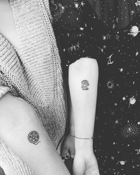 Small Movie Themed Tattoos, Movie Couple Tattoos, Minimalist Movie Tattoo, Simple Movie Tattoos, Cinephile Tattoo, Tattoos For Movie Lovers, Tv Tattoo Ideas, Movie Lover Tattoo, Movie Reel Tattoo