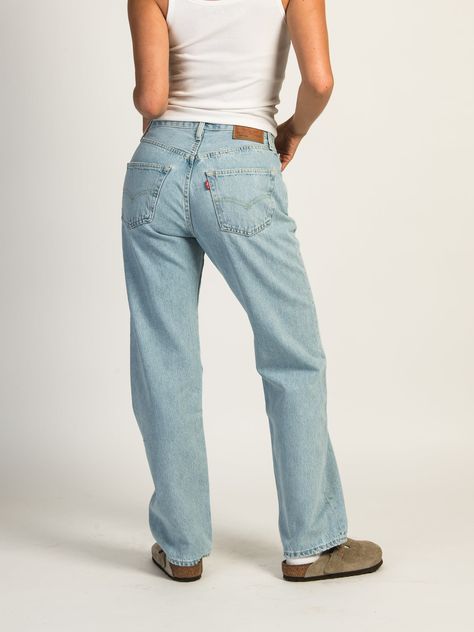 The Levi's 501 90's Jeans checks off all the qualities of being a classic pair of jeans. These pants offer a vintage high-rise fit with the perfect amount of bagginess at the leg to keep you on trend.These jeans feature:- Levi's patch on back- Mid-rise fit- 32" inseam / Model is wearing 25" x 30"- 5 pocket design- Straight leg- Light wash100% CottonModel Measurements Height: 5'7" Waist: 24" Chest: 32" Levi’s 94 Baggy Jean, Levi’s Jeans Outfit, 90s Straight Leg Jeans Outfit, Vintage Levis Jeans Outfit, Levi Jeans Outfit, Levis Jeans Vintage, Levi Pants, Levis 501 Straight Leg, Michael Kors Shop