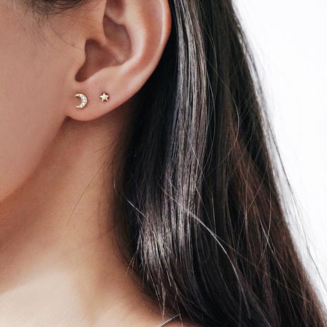 My moon and all my stars... cosmic ear party in our 14K solid gold star and moon stud set  #thingseyelove Double Ear Piercings, Piercing Inspo, Double Piercing, Second Piercing, Cute Ear Piercings, Ear Party, Ear Piercing, Emerald Earrings, Gold Earrings Studs