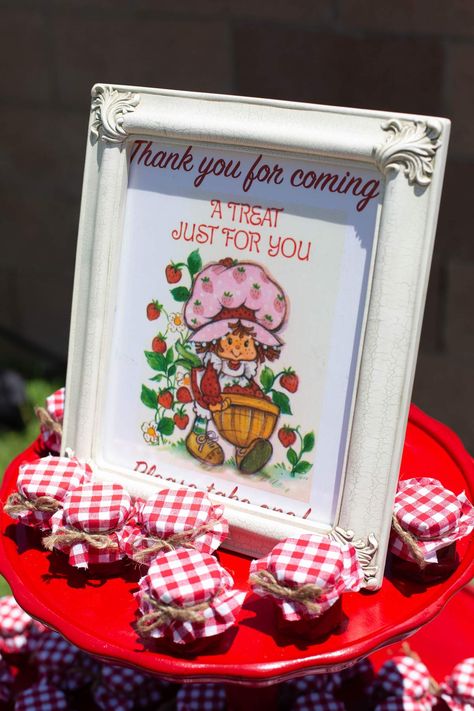 Layla’s Vintage Strawberry Shortcake 1st Birthday | CatchMyParty.com Strawberry Shortcake Baby Shower Ideas Girl, 2nd Strawberry Birthday, Vintage Strawberry Shortcake Party Ideas, Strawberry Shortcake Party Food, Strawberry Shortcake Birthday Centerpieces, Strawberry Shortcake First Birthday Decorations, Strawberry Shortcake Ideas For Party, Strawberry Shortcake Theme Party Ideas, Strawberry Themed Birthday Party Ideas