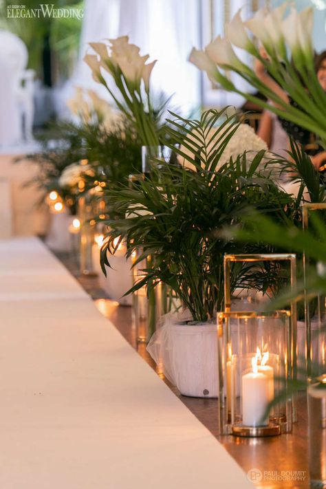 White Gold Wedding with a Tropical Twist | ElegantWedding.ca Indoor Tropical Wedding Ceremony, White And Greenery Reception, Potted Plant Altar Wedding, Green And Gold Beach Wedding, Modern Tropical Wedding Decor, Tropical Wedding Theme Elegant, Island Wedding Decor, White And Gold Wedding Decor, Tropical Modern Wedding