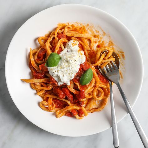 Handmade Chitarra with Spicy Roasted Cherry Tomatoes and Stracciatella | Try this best-ever handmade chitarra pasta with a super simple roasted cherry tomato sauce from Chef Donatella Arpaia. Get the recipe from Food & Wine. Roasted Garlic And Tomatoes, Stracciatella Recipe, Roasted Cherry Tomato Sauce, Pici Pasta, Cherry Tomato Sauce, Roasted Cherry, Roasted Cherry Tomatoes, Cherry Tomato, Roasted Tomatoes