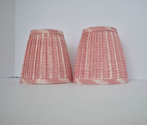 Welcome to ZZ Custom Design!  High quality, beautiful and unique hand  pleated on the top and bottom     gathered  lampshade. Truly elegant and luxurious, made with Cream Pink Ikat Fabric . This listing is for one shade. Lamp Shade Only -Pleated  Gathered shades have a standard, hardback interior.  -Fabric positioning on shades will vary. -Fitting: Regular Round Clip On or Chandelier Clip on  Due to monitor differences, actual colors may vary slightly from what appears online. Please request a free fabric swatch if you're unsure of color                  All my listed lampshades are made with love and care to a professional standard. As a handmade item, every lampshade is different and the pattern might differ slightly from the picture. However, I always select the best pattern placement t Shade Lamp, Brushed Copper, Free Fabric Swatches, Chandelier Shades, Ikat Fabric, Fabric Swatch, Free Fabric, Fabric Swatches, Lamp Shades