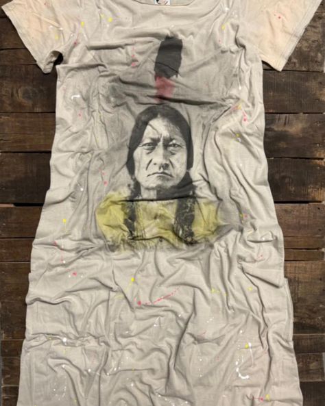 The Jaded Gypsy Moon View Dress is a one size slouch fit T shirt dress with Sitting Bull on front. paint splattered and distressed. Absolutely gorgeous and so stylish! Measurements: O/S: Bust 21" Shoulders 16.5" Length 47.5" Fits upto 2X comfortably #Indian #dress #indiandress #jadedgypsyclothing #jadedgypsy #boho #bohostyle #bohochic #sittingbull #bohoclothing Moon View, Sitting Bull, Indian Dress, Paint Splatter, Indian Dresses, Boho Outfits, T Shirt Dress, Boho Chic, Boho Fashion