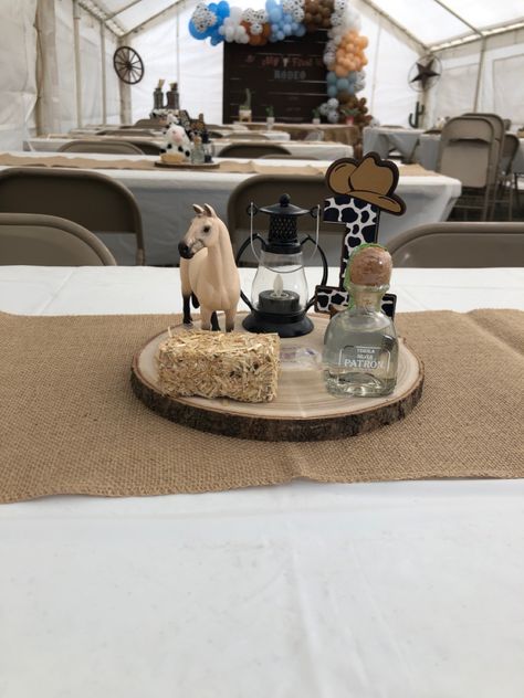 Horses Centerpieces Party Ideas, Jaripeo Centerpieces, Vaquero Table Decor, Western Birthday Centerpiece Ideas, Ranchero Centerpiece Ideas, How The West Was One Centerpieces, Cowboy Theme Table Decor, Vaquero Quinceanera Theme Centerpieces, Paniolo Theme Party