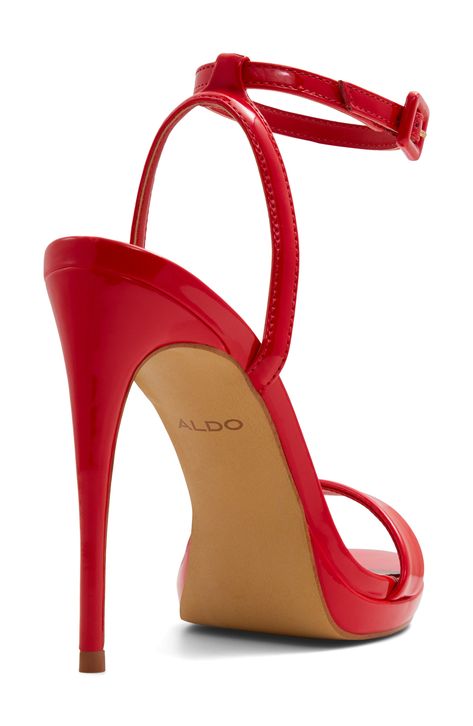 A fierce patent finish highlights the stunning silhouette of this ankle-strap sandal boosted by a subtle platform toe and towering stiletto heel. 4 1/4" heel; 1/2" platform Adjustable ankle strap with buckle closure Cushioned footbed Synthetic upper and lining/rubber sole Made in Brazil Red Platform Heels, Red Stiletto Heels, Very High Heels, Red Stilettos, Strappy Stilettos, Red Sandals, Ankle Heels, Shoe Boot Sandals, Platform Sandals Heels