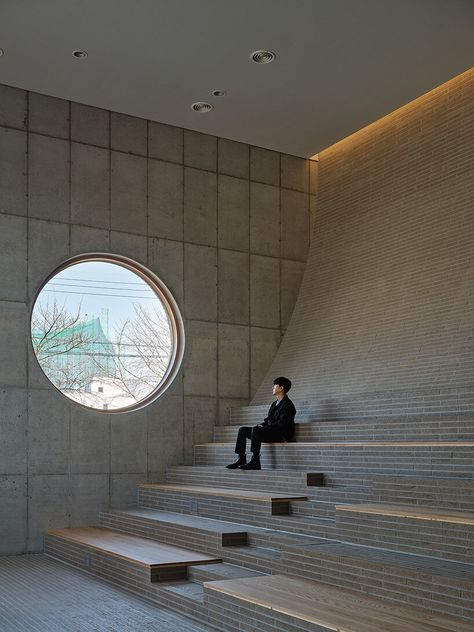 concrete brick façades flow into central yard to form nameless architecture's café in korea Daejeon South Korea, Korean Cafe, Concrete Bricks, The Aesthetics, Architectural Section, Curved Walls, Daejeon, Brick Facade, Architecture Photo