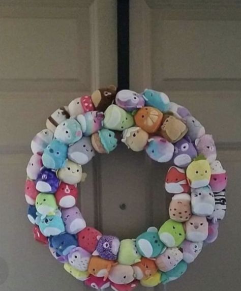 Wreath hand sewn onto metal loop for squishmallow squishvilles display Squishmallow Bookshelf, Squishville Display Ideas, Squishmallow Gift Basket, Squishville Storage, Squishmallows Crafts, Squishmallow Organization Ideas, Squishville Display, Squishmallow Display Ideas, Squishmallow Wall