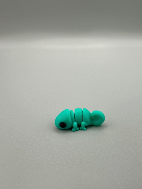 3D Printed Chameleon Fidget Toy is a cute and flexible pet toy that helps relieve stress and. #Fimo #3d_Printed_Fidget_Toy #Fidget_Toys_Diy #Mini_Clay_Ideas What To 3d Print, 3d Printed Fidget Toy, 3d Printed Stuff, 3d Printed Toys, Baby Chameleon, 3d Printing Toys, Break Off, 3d Printing Business, 3d Printing Projects