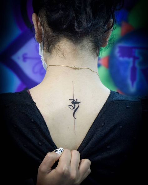 20+ Spiritual Om Tattoo Designs Ideas for Both Men and Women Tattoo In Neck Women, Back Neck Om Tattoo, Tatoos Woman Back Neck, Tattoo On Back Neck For Women, Om Neck Tattoos Women, Om Tattoo On Back Neck, Om Neck Tattoo Men, Om Tatoos Design For Women, Om Tattoos For Women