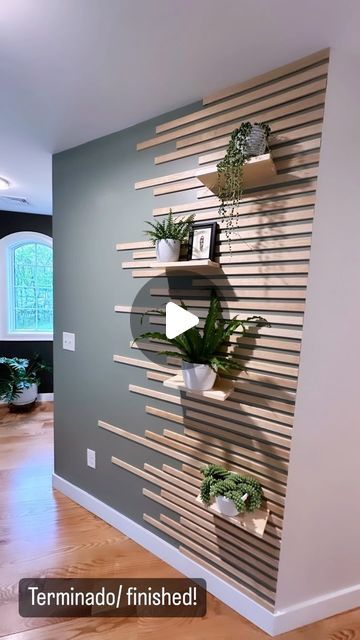 Cyndi N Sepúlveda on Instagram: "Another accent wall for the books/ Otra pared decorada y terminada! #accentwall #plants #evergreenfogsherwinwilliams #homedecor #succulents #paredes #plants #homeimprovement" Wood Slat Wall With Plants, Accent Wall With Plants, Wood Plant Wall, Staircase Accent Wall, Corner Fireplaces, Green Living Room Ideas, Wood Plank Walls, My Bedroom Ideas, House Wall Design