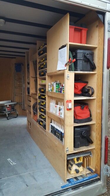 #3 of 8 BEST  PLANNED WORK TRAILER. Starting at the top: plumbing toolbox, next Dewalt toolbox for demolition,  next bags with cordless jig saw, drills,  circular saw, multitool, etc, next, general toolbox with hammer and driver drill, drill and spade bits, chisels, hammer, shears,etc. Bottom bin: saw stand, coping saws, squares. Keep a note pad to list supplies as they are depleted.van organization. Trailer Shelving, Work Truck Storage, Van Organization, Truck Organization, Van Shelving, Trailer Organization, Work Trailer, Miter Saws, Trailer Storage