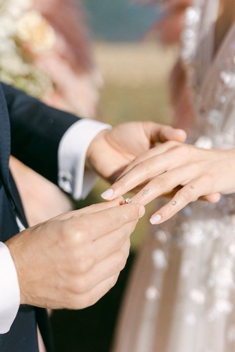 It's the tiny things that kiss and tell the big stories... Unfolding the value and beauty of capturing moments and memories has become my second nature. After all, it feels like time smiles back at us when given the ability to capture these moments, allowing us to revisit and relive them in the future. Photography: @fiorello Planning & Styling: @5th_muse Videography: @lulumeli_com Floral design: @filanthi_floral_design Stationery: @meili.fluous Wedding dress: @madebride Groom’s attire: @gia... Self Foto, Exchanging Rings, Vacation In Italy, Wedding Toss, Paris Couple, Ring Photography, Ring Exchange, Romantic Wedding Inspiration, Deeply In Love