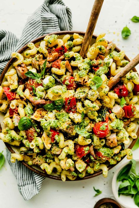 This go-to Chicken Pesto Pasta Salad with Grilled Veggies is a summer staple! Simply toss al dente pasta, grilled lemon chicken & veggies, mozzarella cheese into homemade basil pesto sauce for a fresh & satisfying summer dinner or side dish. This easy pesto pasta salad with chicken is perfect for summer potlucks & cookouts, meal prep lunches, weeknight dinners, & so much more! #chickenpestopastasalad #pestopastasalad #pastasaladrecipes #summerfoodideas #summerrecipes #easydinnerideas #pastasalad Pasta Salad With Chicken, Chicken Pesto Pasta Salad, Summer Bbq Side Dishes, Easy Pesto Pasta, Meal Prep Lunches, Homemade Basil Pesto, Chicken Pesto Pasta, Grilled Lemon Chicken, Basil Pesto Sauce