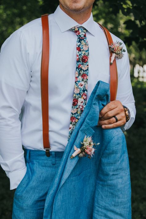 Men’s Floral Wedding Outfit, Wedding Suit With Floral Tie, Men’s Floral Tie Wedding, Floral Tie Suspenders Wedding, Floral Tie Wedding Navy Suits, Blue Floral Groomsmen, Casual Male Wedding Attire, Patterned Tie Wedding, Navy Blue Suit With Floral Tie