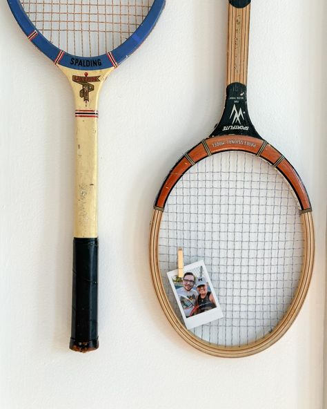 Old tennis rackets were on my 2024 thrift goals list, so ☑️ Also, added a cute lil picture of Zack and I playing tennis. We don’t actually know how to play, and we follow a very loose set of rules, but man — we have fun. ✨ vintage decor, thrifted tennis rackets, Polaroid, @fujifilm_instax_northamerica Tennis Racket Art Wall Decor, Old Rackets Decor, Tennis Rackets On Wall, Old Tennis Racket Decor, Tennis Racket Wall Decor, Vintage Tennis Racket Decor, Tennis Racquet Decor, Thrifted Room Decor, Tennis Bedroom