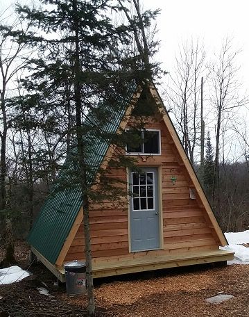 14x14 A-frame tiny cabin built from one of LaMar Alexander's plans Tiny Cabins, Frame Cabin Plans, Small A Frame Cabin, Tiny A Frame Cabin, A Frame Cabin Plans, A Frame House Plans, Frame Cabin, A Frame Cabin, Tiny Cabin