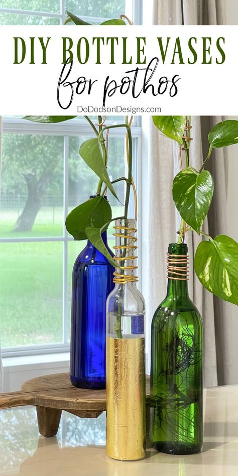 What do you do with your old glass bottles? Don't throw them away! Repurpose them into chic DIY bottle vases to display your pothos cuttings. Whiskey Bottle Crafts, Pothos Cuttings, Farmhouse Thrift Store Makeovers, Glass Bottle Decor, Spring Diy Projects, Wine Bottle Vases, Old Glass Bottles, Empty Glass Bottles, Old Vases