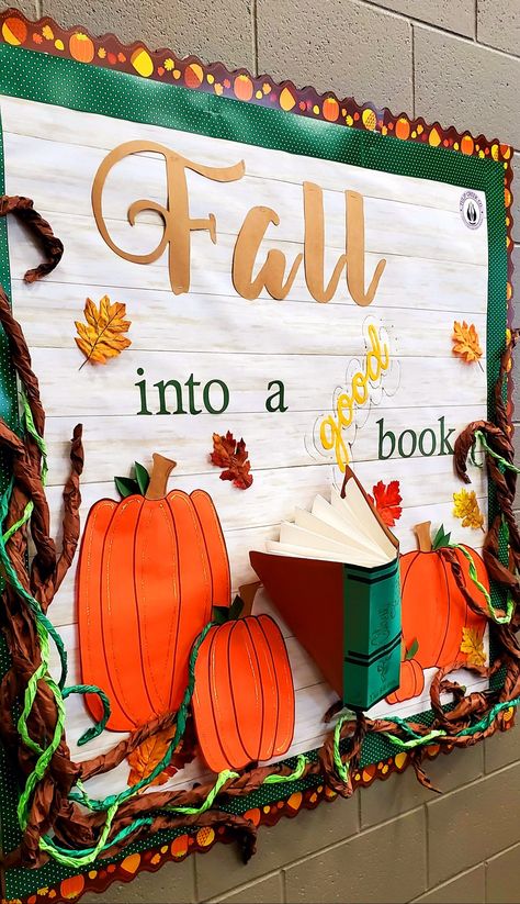 October Reading Bulletin Boards, Fall Into Books Bulletin Board, Pumpkin Library Display, Preschool Library Bulletin Board Ideas, Fall Into Reading Bulletin Board, Fall Decorations For Library, Fall Bulletin Board Ideas For Library, Fall Library Display Ideas, Fall Book Bulletin Board