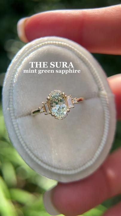 No.3 Sura: MINT GREEN SAPPHIRE✨ This 1.5 CT sapphire is out of this wo... | Engagement Ring | TikTok Green Saphhire Engagement Ring, Gem Stone Engagement Rings Classy, Not Basic Engagement Rings, Sage Sapphire Engagement Ring, Engagement Rings Light Green, Baby Blue Engagement Ring, Pale Blue Sapphire Engagement Ring, Seafoam Green Engagement Ring, Engagement Ring No Stone