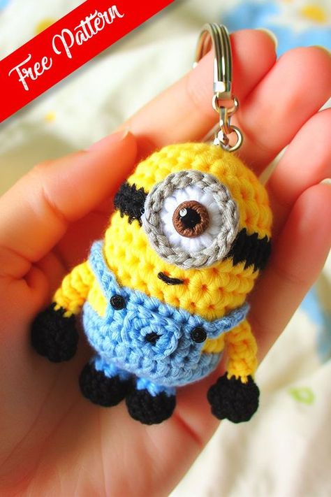 This delightful mini crochet Minion keychain encapsulates the playful spirit of the mischievous characters known from popular culture, all within a compact and cuddly amigurumi design. Crochet Minion Keychain, Crochet Pattern Free Keychain, Crochet Minions Pattern Free Amigurumi, Minions Amigurumi, Minion Keychain, Mini Crochet Animals, Printable Crochet Patterns, Crochet Amigurumi Keychain, Graphic Crochet