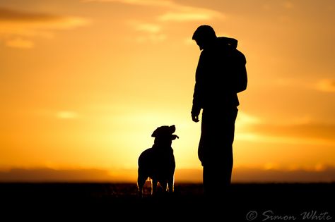 I took this moments before the sun set. The colours are straight out of camera, just cropped it slightly and added a bit of sharpening in Lightroom.   Thank you for all the comments.... Man And Dog Silhouette, Man And Dog Drawing, Dog With Man, Man With Dog, Man And His Dog, Milan Kundera, Puppy Photography, Military Working Dogs, Silhouette Photography