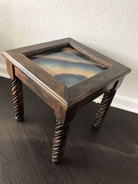 This small side table was in need of a little sprucing up. I loved the spiraled legs but the glass top was dirty and the wood finish was bland. So I decided to to replace the glass top with a resin insert and stain the wood a bit darker. When I first moved to my new city, I had nearly all the furniture I could possibly need except side tables. I didn't have a single one, which sparked my buying spree of several small tables to spread through my apartment.I picked up this one on Faceb… Charcoal Grey Sofa, End Table Makeover, Side Table Makeover, Faux Granite, Glass Top End Tables, Glass Top Side Table, Grey Sofa, Doors And Floors, Glass End Tables