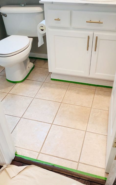 White Painted Tiles Bathroom, Aesthetic Bathroom Floor Tile, Replacing Kitchen Tile Floor, Cover Bathroom Tile Floor, Ceramic Tile Makeover, Black Painted Tile Floor Bathroom, Floor Tile Paint Before And After, Limewash Tile Floor, Faux Marble Painted Tile Floor