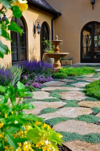 Flagstone path.. Flagstone Front Yard, Mediterranean Garden Courtyard, Country Landscaping Ideas, Tuscan Landscape Design, French Country Landscaping, Country Garden Landscaping, Mediterranean Courtyard, Backyard Escape, Mediterranean Garden Design