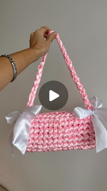 𝓫𝔂𝓰𝓪𝓵𝓴 - crochet patterns for beginners 🎀 on Instagram: "Crocheting with thick satin ribbon yarn to make this gorgeous satin bow handbag inspired by @nina.new.york 🎀 Perfect crochet handbag for a wedding guest 💒 I think I am now addicted to satin ribbon yarn, need to order more! It gives a luxurious touch to your crochet bags #crochet #crochetaddict #crochetersofinstagram #satinbow #crochetbow #bows #ribbons #bowbag #crochethandbag #crochet #slowfashion #slowfashion #knittingbags #knitbag #amigurumi" Crochet With Ribbon Yarn Ideas, Crochet With Ribbon Yarn, Satin Ribbon Crochet Bag, Crochet Ribbon Bag, Crochet Ribbon Yarn, Crochet With Ribbon, Thick Yarn Crochet, Satin Ribbon Crafts, Crochet Bow Bag