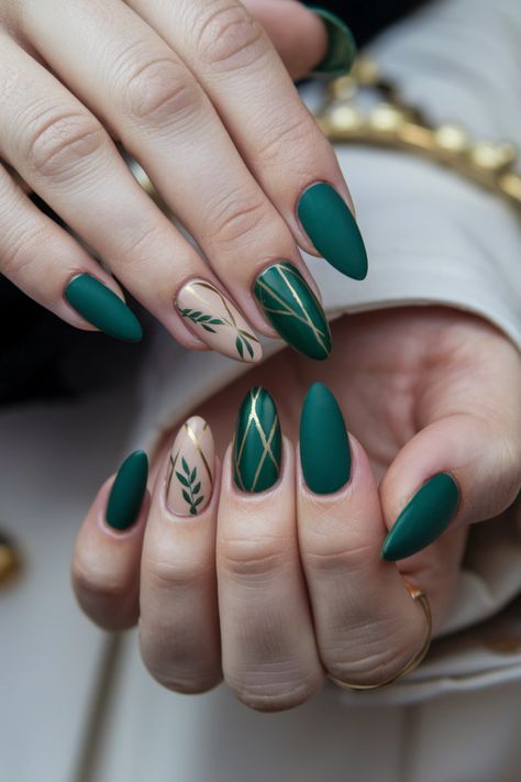 Embrace the beauty of autumn with these stunning olive green nails featuring delicate maple leaf designs. This chic style perfectly captures the essence of fall, blending rich green tones with warm, earthy accents. Whether you鈥檙e heading to a harvest festival or just want to celebrate the season, this look is both artistic and sophisticated. Get inspired by these fall nail ideas and elevate your nail game! Olive Nail Art Designs, Thanksgiving Nail Ideas Green, Pretty Almond Nail Designs, November Green Nails, Loki Nails Simple, Blue Fall Nails 2024, Thanksgiving Nails Green, Green Thanksgiving Nails, Green Vine Nails