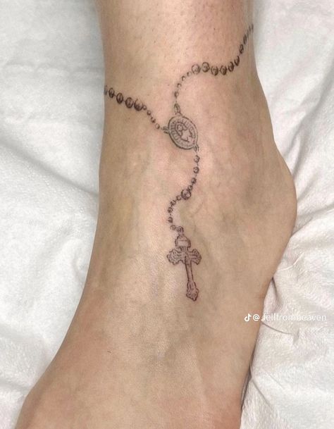 Rosery Tattoos On Arm, Christina’s World Tattoo, Rosery Tattoos For Women On Arm, Scapular Tattoo, Red Rosary Tattoo, Dainty Rosary Tattoo, Rosery Tattoos Ankle, Rosary Tattoo Ankle, Cross Chain Tattoo