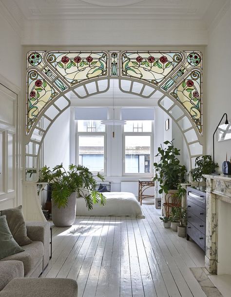 Bedroom, Bed, Pendant Lighting, and Painted Wood Floor "I like lamps with opal white and brass elements," Taeyman adds, who used lamps of different heights throughout the space. Photo 9 of 12 in An Antwerp Apartment Captures the Spirit of the Belle Époque زجاج ملون, Foyer Design, Diy Interior, House Goals, A Living Room, Architectural Digest, Design Case, Belle Epoque, My New Room