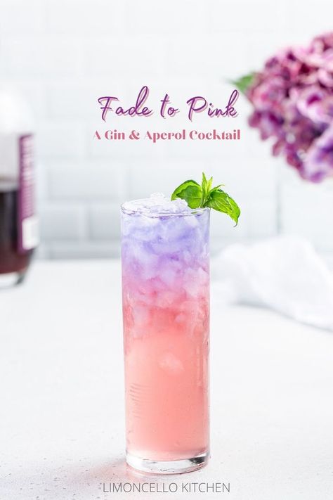 Highball cocktail on a countertop with pink and purple layers and a mint sprig cocktail. Empress Gin, Layered Cocktails, Layered Drinks, Purple Drinks, Gin Cocktail Recipes, Gin Drinks, Colorful Cocktails, Pink Gin, Fancy Drinks