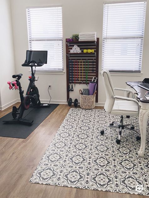 Workout Area In Office, Small Gym Office Combo Work Spaces, Small Space Exercise Room Ideas, Organize Spare Room, Peloton In Office Ideas, Black Furniture Office Decor, Small Peloton Space, Office And Workout Room Combo Ideas, Exercise Space Home