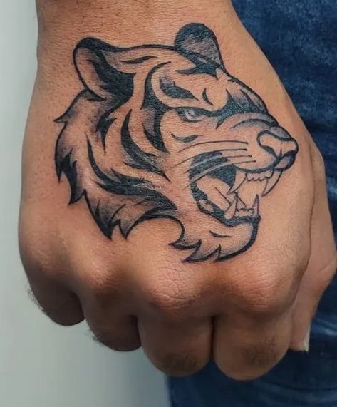 Latest 60 Hand Tattoos For Men and Women - Tips and Beauty Tatoos Men Ideas Hand, Tattoo Designs Men Hand, Lion Tattoo Hand, Latest Tattoos For Men, Hand Tattoo Designs For Women, Tattoo Hand Men, Hand Tats Men, Hand Tattoo Ideas For Men, Medical Tattoos