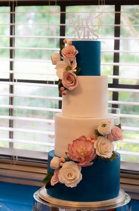 4 tier wedding cake with blush, pink,and white sugar flowers Tampa Bay Navy Blue And Blush Pink Wedding Cake, Navy Blue And Blush Wedding Cake, Navy Blue And Pink Wedding Cake, Navy And Pink Wedding Cake, Navy Blue And Pink Cake, Navy And Blush Wedding Cake, Blue And Pink Wedding Cake, Pink And Blue Wedding Cake, 4 Tier Wedding Cakes