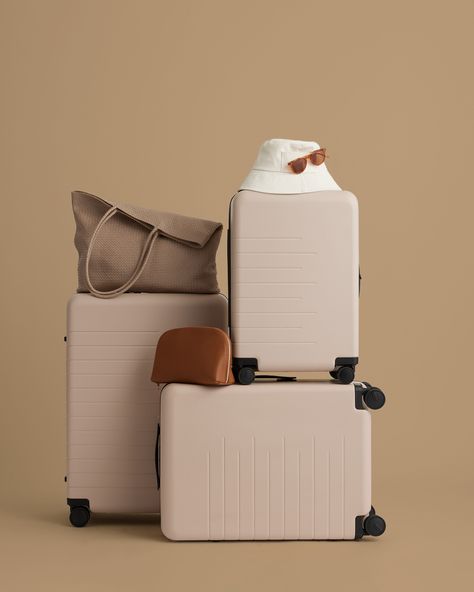 Ready to have your smoothest home-for-the-holidays experience ever? No guarantees on getting along with your sister, but we can promise that the Japanese-crafted, 360-degree wheels on our ultra-light suitcases will help while you’re en route. Mix and match our beige and tan bags to keep your color palette tight. Luggage Product Photography, Travel Props, Suitcase Photography, Organized Minimalist, Luggage Photography, Neoprene Backpack, Preppy Travel, Luxury Travel Bag, Samsonite Luggage