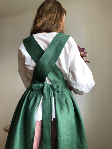 Green Linen Pinafore Apron Dress Half Apron Skirt | Etsy Cottagecore Apron Dress, Gardening Outfits For Women, Apron Aesthetic, Pinafore Apron Pattern, Cottagecore Apron, Pinafore Apron Dress, Linen Pinafore Apron, Embroidery Aprons, Skirt Cottagecore