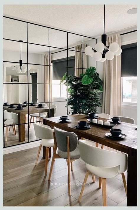 Are Mirrored Walls Out Of Style? Mirrored Wall Decor Living Room, Mirror Feature Wall Design, Dinning With Mirror Wall, Feature Wall Mirror Living Rooms, Dinning Mirror Wall Decor, Dining With Mirror Wall, Kitchen Table With Mirror On Wall, Dining Mirror Wall Decor, Mirror Wall Dining Room Modern