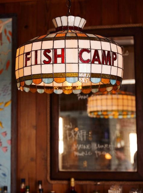 Sullivan’s Fish Camp - SDCO Partners Sullivans Fish Camp, Fish Store Aesthetic, Gemini Logo, Nautical Gallery Wall, Wyoming Ranch, Eclectic Restaurant, Lake Theme, Seaside Restaurant, Oyster Knife