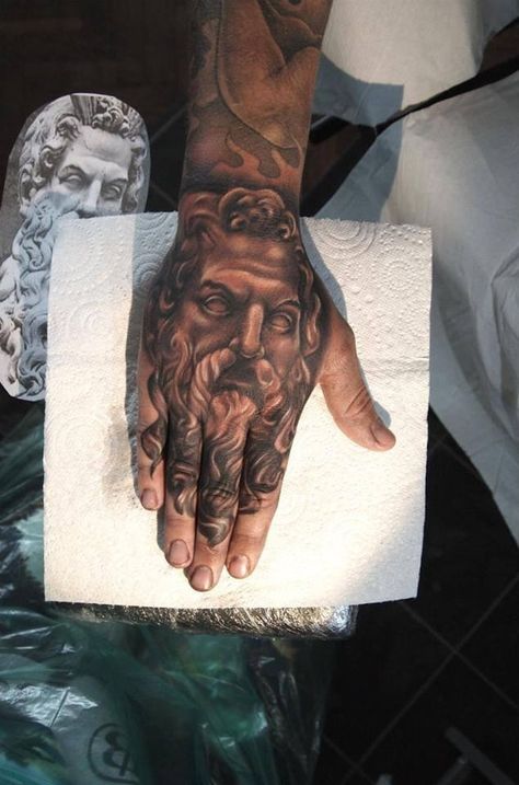 Portrait hand tattoo Boys Hand Tattoo, Hand Tattoo Images, Zeus Tattoo, Knuckle Tattoos, Tattoo Prices, Greek Tattoos, Gaming Tattoo, Tattoo Videos, Hand Tattoos For Guys