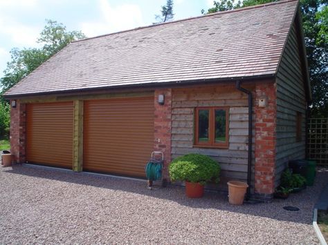 Double Garage Door on Brick/Wood Outbuilding Garage With Room Above, Garage Extension, Double Garage Door, Garage Door Company, Cow Shed, Finished Garage, Roof Lantern, Garage Remodel, Brick And Wood