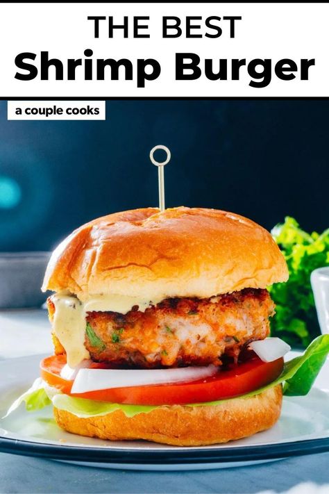 This shrimp burger recipe is juicy and so satisfying! Throw it on a bun with a creamy sauce or serve over greens for a tasty meal. Pop over to our site for the recipe! Shrimp Burger Recipe, Vegan Brunch Recipes, Best Fish Recipes, Shrimp Burger, On A Bun, Winter Salad Recipes, Salad Dressing Recipes Healthy, A Couple Cooks, Healthy Burger