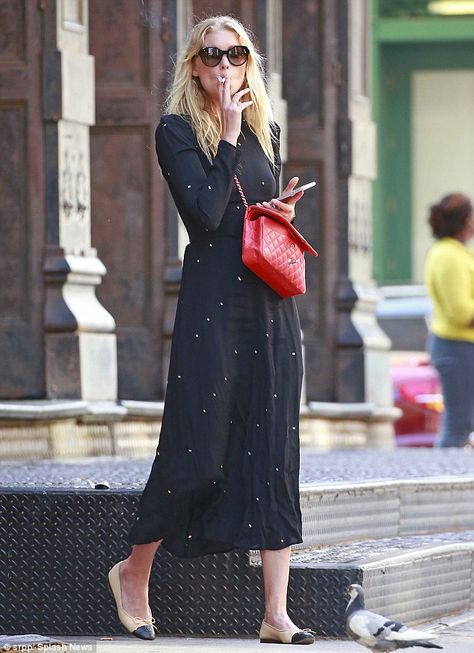 Elsa Hosk still manages to turn heads in a prairie dress as she puffs on a cigarette | Daily Mail Online Elsa Hosk Style, Dress With Flats, Models Off Duty Style, Parisienne Chic, Street Dress, Estilo Hippie, Red Purse, Model Street Style, Elsa Hosk