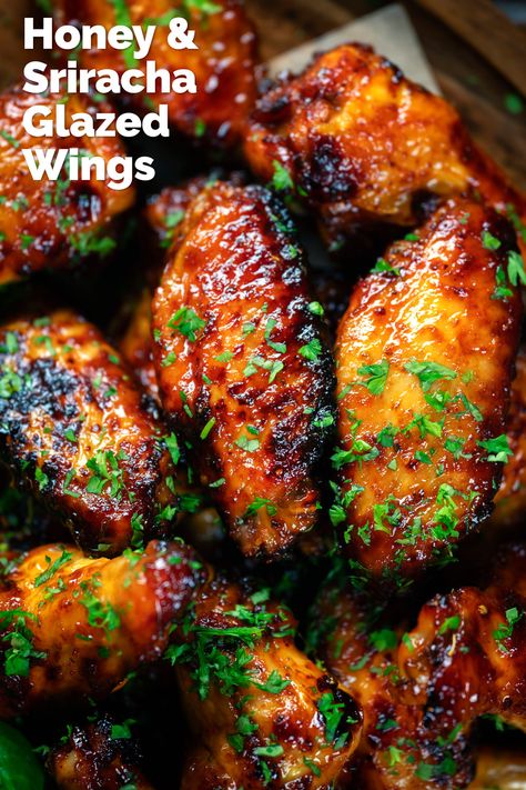 Honey and sriracha chicken wings with a yummy sweet & spicy glaze, with instructions for cooking in an Air Fryer, on the BBQ & in an oven. These delicious finger-licking wings take around 30 minutes to cook in an air fryer or on the BBQ, and around hour in the oven. Spicy Air Fryer Chicken Wings, Wings Recipe Spicy, How To Cook Chicken Wings In Air Fryer, Chicken Wings On The Bbq, Chicken Wings In Oven Recipes, Spicy Honey Garlic Chicken Wings, Korean Wings Air Fryer, Honey Sriracha Wings, Asian Chicken Wings Air Fryer